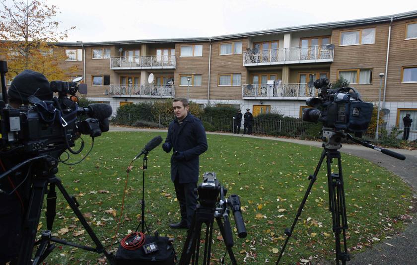 Media report outside a property in Lambeth, south London November 23, 2013. u00e2u20acu201d Reuters pic