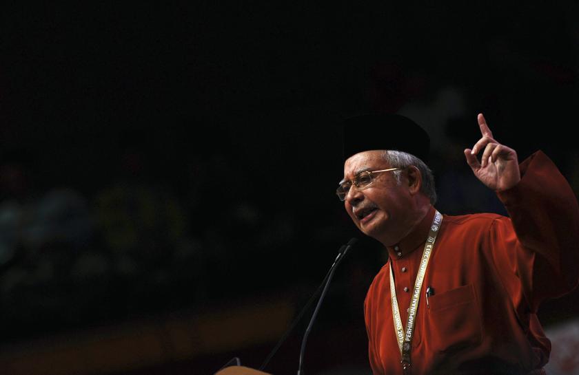 Umno president Datuk Seri Najib Razak delivers his keynote address during the opening of the 2013 United Malays National Organisation General Assembly at the Putra World Trade Centre in Kuala Lumpur December 5, 2013. u00e2u20acu201du00c2u00a0Reuters pic