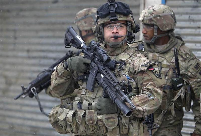US troops with the International Security Assistance Force keep watch at the site of a suicide attack in Kabul, February 27, 2013. u00e2u20acu201c Reuters pic