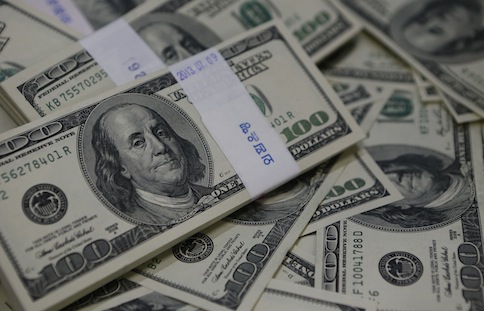 US one-hundred dollar bills are seen in this photo illustration at a bank in Seoul August 2, 2013. u00e2u20acu201d Reuters pic