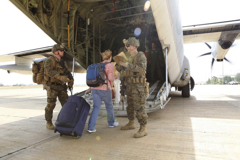 Marines and sailors with Special-Purpose Marine Air-Ground Task Force Crisis Response help US citizens into a Marine Corps KC-130J Hercules airplane during an evacuation of personnel from the US Embassy, in Juba, South Sudan, January 3, 2014. u00e2u20acu201d Reuters 