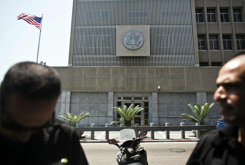 Security personnel for the U.S. embassy stand in front of the embassy in Tel Aviv August 2, 2013. U.S. embassies that would normally be open this Sunday - including those in Abu Dhabi, Baghdad and Cairo - will be closed that day because of unspecified sec