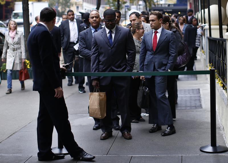 Job seekers stand in line to meet with prospective employers at a career fair in New York City, October 24, 2012. u00e2u20acu201d Reuters pic