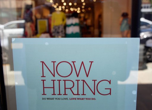 An employment sign is placed in the window of Banana Republic clothing store on June 21, 2013 in Pasadena, California. u00e2u20acu201d AFP pic
