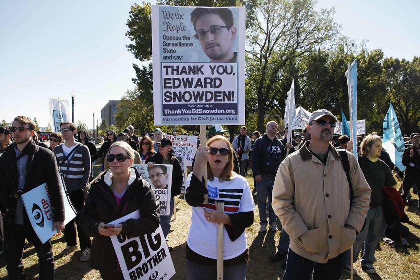 Demonstrators hold signs supporting fugitive former NSA contractor Edward Snowden as they gather for the u00e2u20acu02dcStop Watching Us: A Rally Against Mass Surveillanceu00e2u20acu2122 near the US Capitol in Washington, October 26, 2013. u00e2u20acu201d Reuters pic