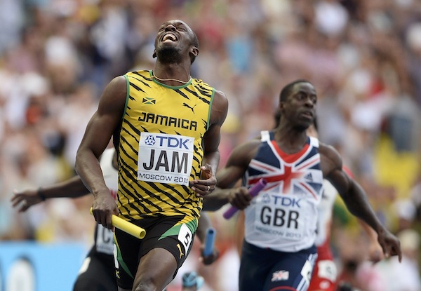 Usain Bolt of Jamaica celebrates after running the final leg to win the menu00e2u20acu2122s 4x100 metres relay final during the IAAF World Athletics Championships in Moscow August 18, 2013. u00e2u20acu201d Reuters pic
