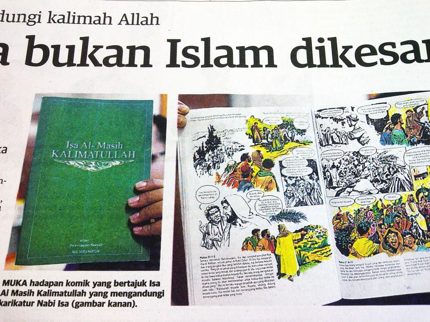 Photograph of the front-cover and contents of a comic book used by the non-Muslim movement as seen in Utusan Malaysia's report dated December 17, 2013.