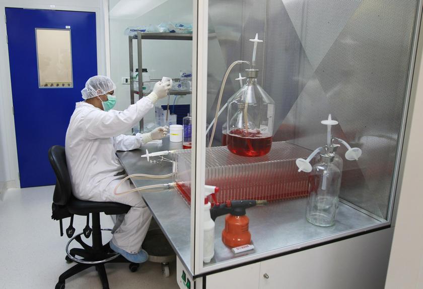 An employee works at SciVac's laboratory in the central Israeli city of Rehovot July 14, 2013. u00e2u20acu201c Reuters pic