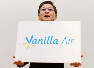 AirAsia Japan President Tomonori Ishii unveils its new brand name 'Vanilla Air' during a press conference in Tokyo on August 20, 2013.– AFP pic
