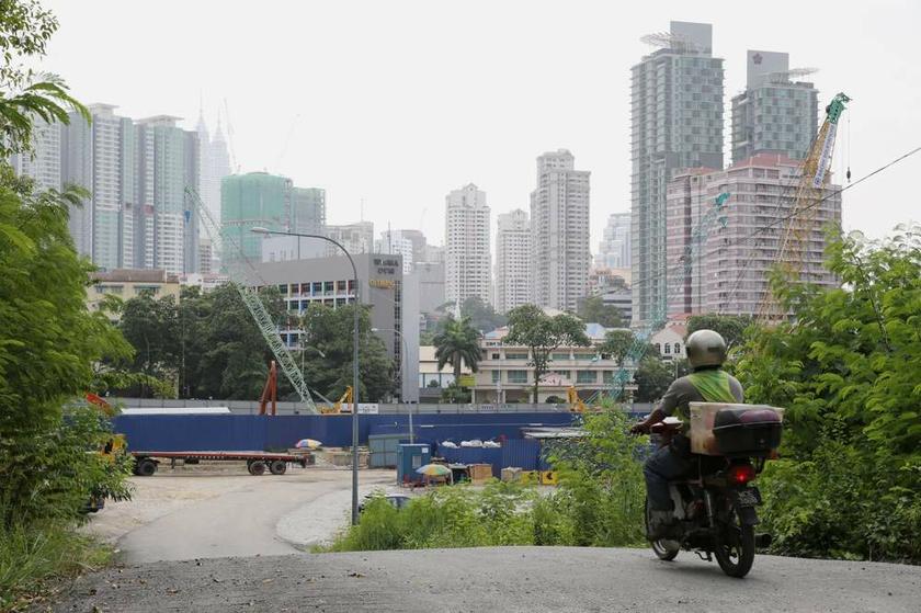 Construction work for the MRT project is seen near the proposed site of the Warisan Merdeka project in Kuala Lumpur on June 27, 2013.