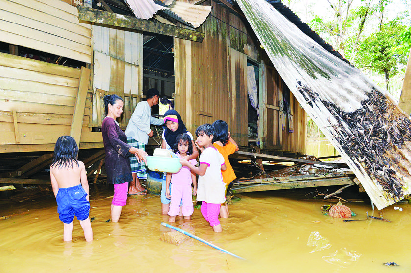 Rani and his family lost everything in the flood. u00e2u20acu201d Picture by Hadzme Mohd Jaafar