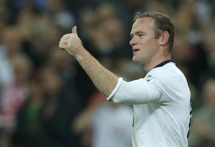 England's Wayne Rooney celebrates after scoring during their 2014 World Cup qualifying match against Poland at Wembley Stadium in London October 15, 2013.u00c2u00a0u00e2u20acu201du00c2u00a0Reuters pic