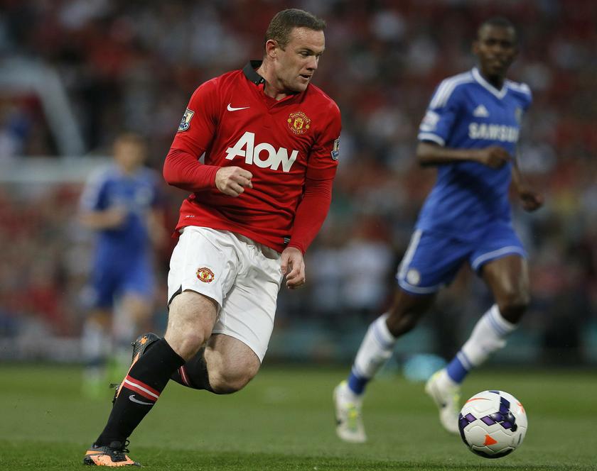 Manchester United's Wayne Rooney runs with the ball during their English Premier League match against Chelsea at Old Trafford, northern England August 27, 2013. u00e2u20acu201c Reuters pic