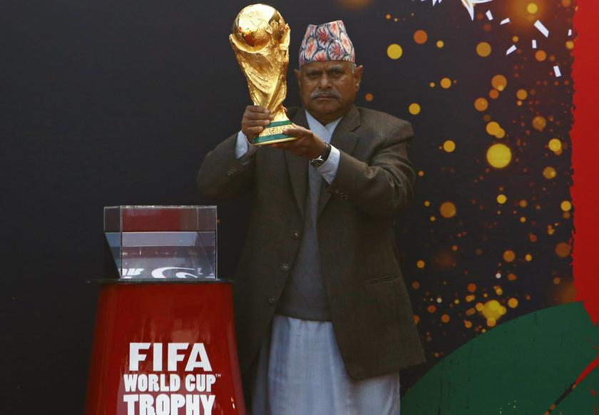 Nepal's President Ram Baran Yadav holds the World Cup trophy during the FIFA World Cup Trophy Tour in Kathmandu, December 21, 2013. u00e2u20acu201d Reuters pic