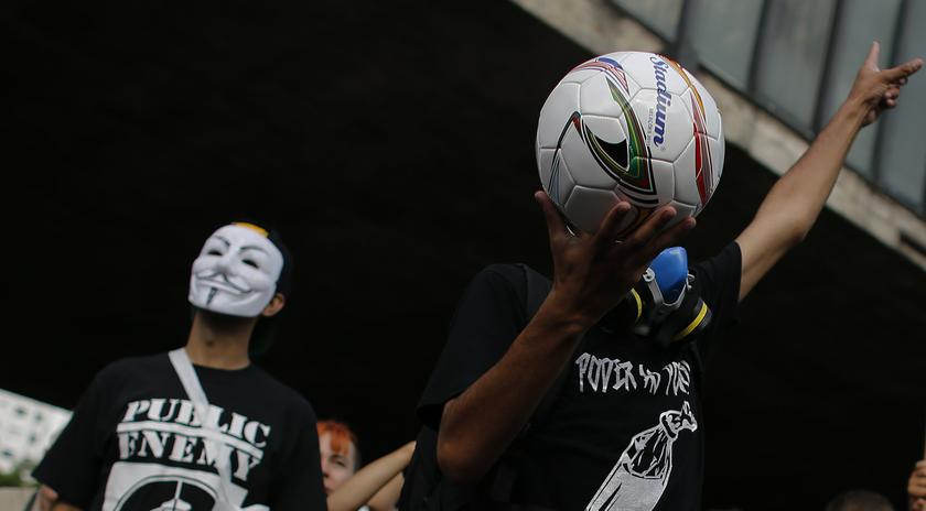 A man holds a football during a protest against the 2014 World Cup, in Sao Paulo January 25, 2014. u00e2u20acu201du00c2u00a0Reuters pic