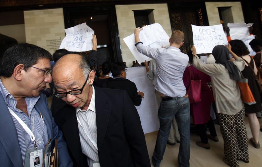 Delegates take a detour as activists protest outside the plenary room of the ninth World Trade Organisation (WTO) Ministerial Conference in Nusa Dua, Bali December 6, 2013. u00e2u20acu201d Reuters pic