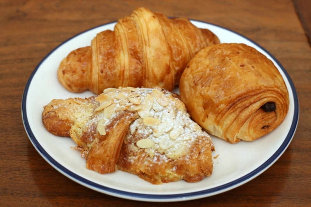 Pastries like plain, almond and chocolate croissants are available for takeaway at Yeast Bistronomy.