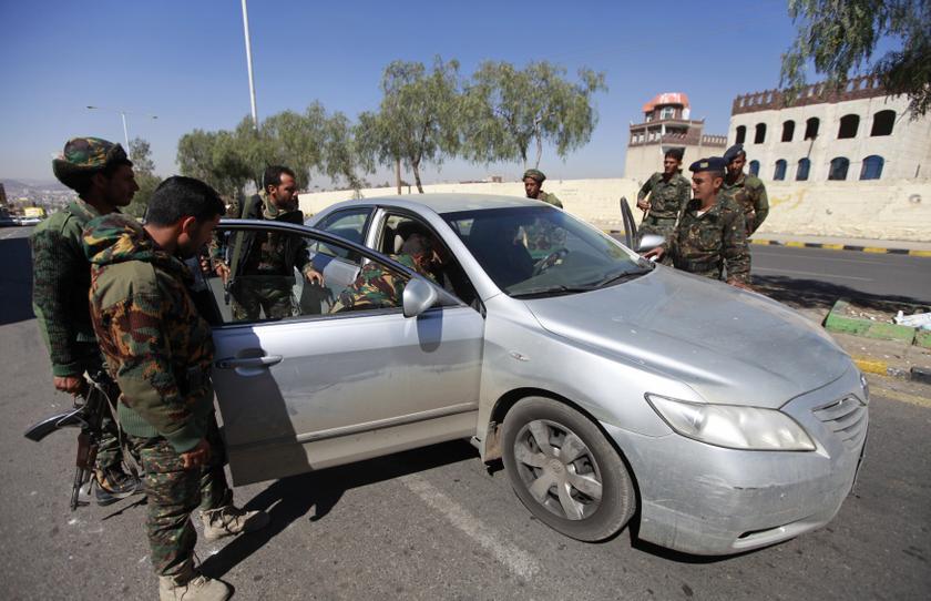 Yemeni policemen search a car at the entrance of the British embassy in Sanaa December 8, 2013. u00e2u20acu201d Reuters pic
